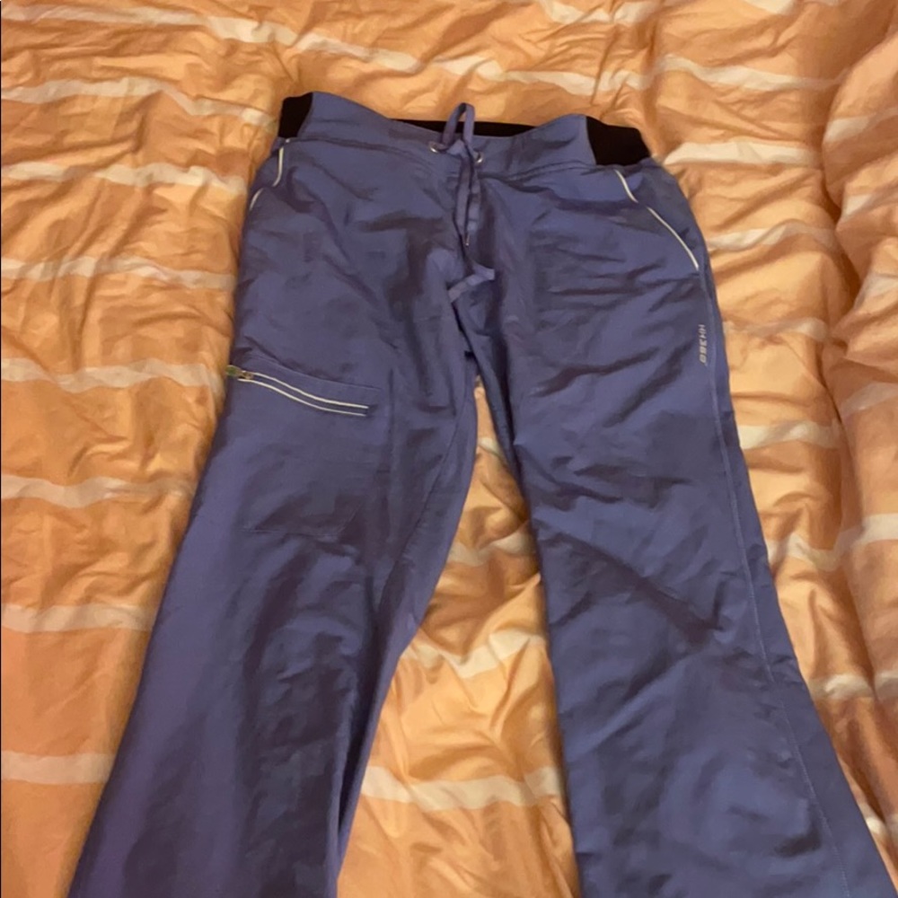 Light blue scrub top and bottom.
